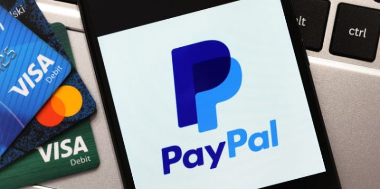 如何在PayPal中手动更改汇率进行交易？